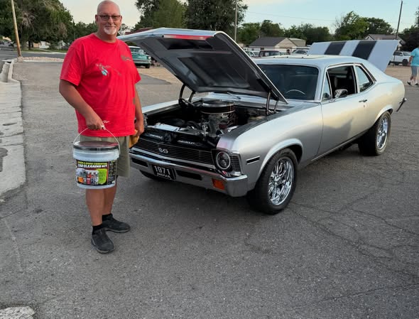Cars and community members gathered at the monthly cruise-in